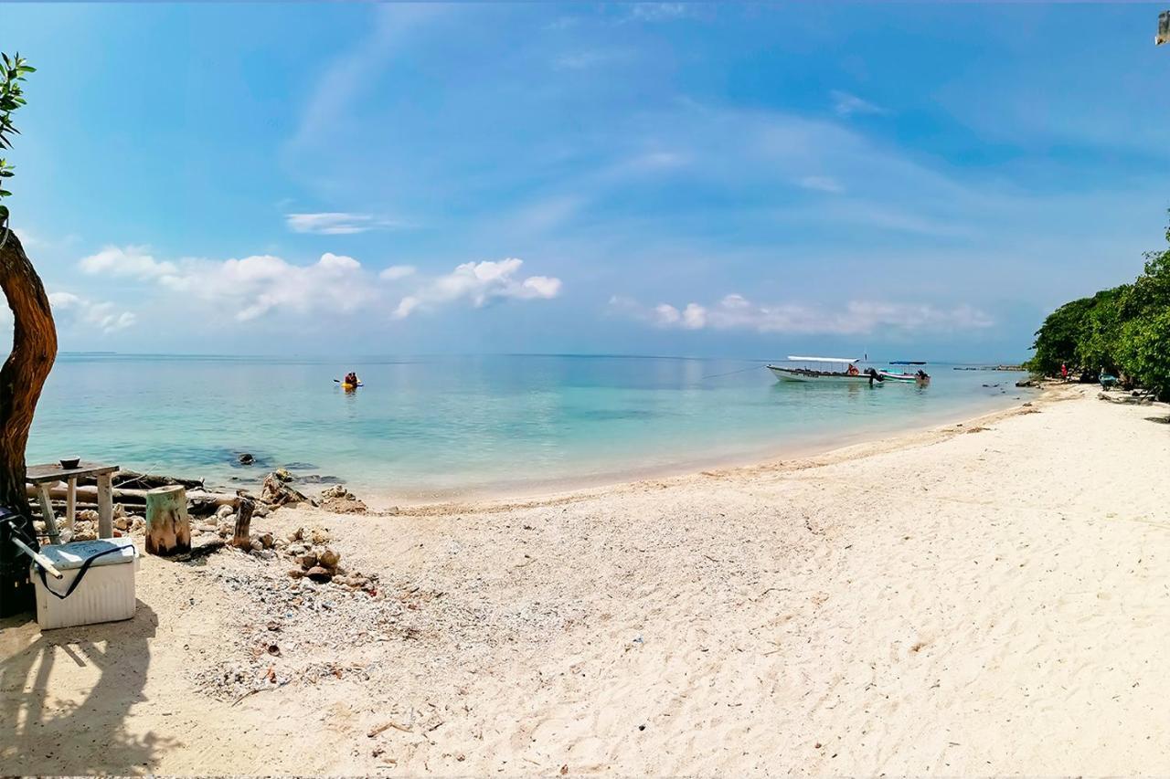 Отель Puerto Caracol Остров Мукура Экстерьер фото